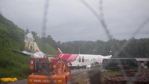 The Air India Express flight that skidded off a runway while landing at the airport in Kozhikode, Kerala, Saturday, Aug. 8, 2020.(AP)