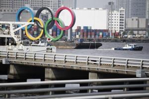 Tugboats move a symbol installed for the Olympic and Paralympic Games Tokyo 2020 on a barge from its usual spot off the Odaiba Marine Park in Tokyo Thursday, Aug. 6, 2020.(AP) Tugboats move a symbol installed for the Olympic and Paralympic Games Tokyo 2020 on a barge from its usual spot off the Odaiba Marine Park in Tokyo Thursday, Aug. 6, 2020.(AP)