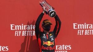 Red Bull’s Max Verstappen celebrates his win on the podium after the race.(Reuters) Red Bull’s Max Verstappen celebrates his win on the podium after the race.(Reuters)