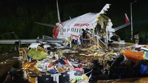 An Air India Express flight en route from Dubai skidded off the runway while landing at Kozhikode International Airport, in Kozhikode, Kerala on Friday.(HT Photo) An Air India Express flight en route from Dubai skidded off the runway while landing at Kozhikode International Airport, in Kozhikode, Kerala on Friday.(HT Photo)