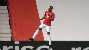 Soccer Football - Europa League - Round of 16 Second Leg - Manchester United v LASK Linz - Old Trafford, Manchester, Britain - August 5, 2020 Manchester United's Anthony Martial celebrates scoring their second goal, as play resumes behind closed doors following the outbreak of the coronavirus disease (COVID-19) REUTERS/Carl Recine(REUTERS) Soccer Football - Europa League - Round of 16 Second Leg - Manchester United v LASK Linz - Old Trafford, Manchester, Britain - August 5, 2020 Manchester United's Anthony Martial celebrates scoring their second goal, as play resumes behind closed doors following the outbreak of the coronavirus disease (COVID-19) REUTERS/Carl Recine(REUTERS)