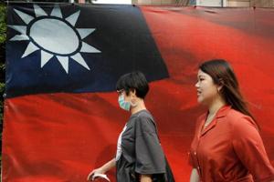 People walk past a Taiwanese flag amid the coronavirus disease pandemic in Taipei, Taiwan, August 10, 2020(REUTERS) People walk past a Taiwanese flag amid the coronavirus disease pandemic in Taipei, Taiwan, August 10, 2020(REUTERS)