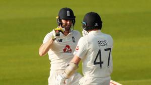 Cricket - First Test - England v Pakistan - Emirates Old Trafford, Manchester, Britain - August 8, 2020 England's Chris Woakes celebrates winning the match with Dom Bess, as play resumes behind closed doors following the outbreak of the coronavirus disease (COVID-19) REUTERS/Lee Smith/Pool(REUTERS) Cricket - First Test - England v Pakistan - Emirates Old Trafford, Manchester, Britain - August 8, 2020 England's Chris Woakes celebrates winning the match with Dom Bess, as play resumes behind closed doors following the outbreak of the coronavirus disease (COVID-19) REUTERS/Lee Smith/Pool(REUTERS)