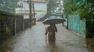 Kochi: A man wades through a flood affected area during heavy rainfall, in Kochi, Friday, Aug. 7, 2020. (PTI Photo)(PTI07-08-2020_000122B)(PTI) Kochi: A man wades through a flood affected area during heavy rainfall, in Kochi, Friday, Aug. 7, 2020. (PTI Photo)(PTI07-08-2020_000122B)(PTI)