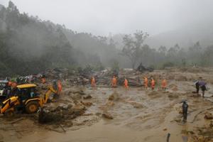 Rescuers work at the site of a mudslide triggered by heavy monsoon rain in Idukki district, Kerala, August 7, 2020(AP) Rescuers work at the site of a mudslide triggered by heavy monsoon rain in Idukki district, Kerala, August 7, 2020(AP)