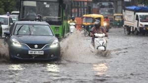 Commuters make their way past waterlogging along Rohtak Road due to heavy rains at Zakhira in New Delhi, India, on Thursday, August 13, 2020.(Sanchit Khanna/HT PHOTO) Commuters make their way past waterlogging along Rohtak Road due to heavy rains at Zakhira in New Delhi, India, on Thursday, August 13, 2020.(Sanchit Khanna/HT PHOTO)