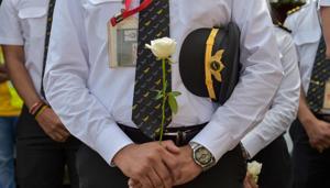 Air India staff at the funeral of Captain Deepak Sathe who died in the Air India Express flight crash in Kozhikode.(PTI) Air India staff at the funeral of Captain Deepak Sathe who died in the Air India Express flight crash in Kozhikode.(PTI)