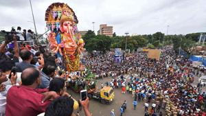 Devotees carry the 61ft tall Lord Ganesh idol for immersion in Hyderabad on September 12, 2019.(PTI File Photo) Devotees carry the 61ft tall Lord Ganesh idol for immersion in Hyderabad on September 12, 2019.(PTI File Photo)