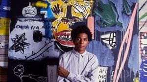 A file photo of Jean-Michel Basquiat with his artwork in the background in New York. (Representational Image)(@hiartsnyc/Instagram)