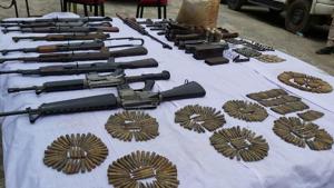 Some of the arms and ammunition recovered by Assam Police.(HT Photo) Some of the arms and ammunition recovered by Assam Police.(HT Photo)