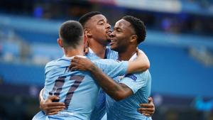 Soccer Football - Champions League - Round of 16 Second Leg - Manchester City v Real Madrid - Etihad Stadium, Manchester, Britain - August 7, 2020 Manchester City's Raheem Sterling celebrates scoring their first goal with teammates, as play resumes behind closed doors following the outbreak of the coronavirus disease (COVID-19) Pool via REUTERS/Dave Thompson(Pool via REUTERS) Soccer Football - Champions League - Round of 16 Second Leg - Manchester City v Real Madrid - Etihad Stadium, Manchester, Britain - August 7, 2020 Manchester City's Raheem Sterling celebrates scoring their first goal with teammates, as play resumes behind closed doors following the outbreak of the coronavirus disease (COVID-19) Pool via REUTERS/Dave Thompson(Pool via REUTERS)