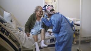 Nurse Virginia Garcia greets Blanca Ortiz, 84, who will be dismissed from the Eurnekian Ezeiza Hospital, on the outskirts of Buenos Aires, Argentina, Thursday, Aug. 13, 2020, several weeks after being admitted with COVID-19 symptoms. (Representational)(AP) Nurse Virginia Garcia greets Blanca Ortiz, 84, who will be dismissed from the Eurnekian Ezeiza Hospital, on the outskirts of Buenos Aires, Argentina, Thursday, Aug. 13, 2020, several weeks after being admitted with COVID-19 symptoms. (Representational)(AP)