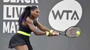 Serena Williams returns a shot to her sister Venus Williams during the WTA tennis tournament in Nicholasville.(AP) Serena Williams returns a shot to her sister Venus Williams during the WTA tennis tournament in Nicholasville.(AP)