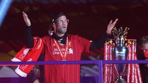 Soccer Football - Premier League - Liverpool v Chelsea - Anfield, Liverpool, Britain - July 22, 2020 Liverpool manager Juergen Klopp celebrates after winning the Premier League Pool via REUTERS/Laurence Griffiths(Pool via REUTERS) Soccer Football - Premier League - Liverpool v Chelsea - Anfield, Liverpool, Britain - July 22, 2020 Liverpool manager Juergen Klopp celebrates after winning the Premier League Pool via REUTERS/Laurence Griffiths(Pool via REUTERS)