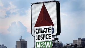 Members of an environmental group hangs a banner that reads “CLIMATE CHANGE NOW” on the iconic Citgo sign near Boston's Fenway Park in Kenmore Square on Monday, Aug. 8, 2020 in Boston.(AP) Members of an environmental group hangs a banner that reads “CLIMATE CHANGE NOW” on the iconic Citgo sign near Boston's Fenway Park in Kenmore Square on Monday, Aug. 8, 2020 in Boston.(AP)