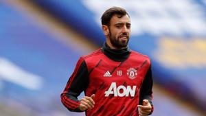 FILE PHOTO: Soccer Football - FA Cup Semi Final - Manchester United v Chelsea - Wembley Stadium, London, Britain - July 19, 2020 Manchester United's Bruno Fernandes during the warm up before the match, as play resumes behind closed doors following the outbreak of the coronavirus disease (COVID-19) Pool via REUTERS/Alastair Grant(Pool via REUTERS) FILE PHOTO: Soccer Football - FA Cup Semi Final - Manchester United v Chelsea - Wembley Stadium, London, Britain - July 19, 2020 Manchester United's Bruno Fernandes during the warm up before the match, as play resumes behind closed doors following the outbreak of the coronavirus disease (COVID-19) Pool via REUTERS/Alastair Grant(Pool via REUTERS)