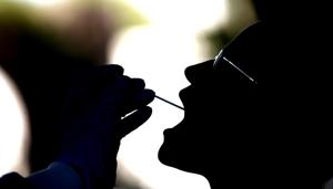 SalivaDirect is simpler, less expensive and less invasive than the traditional method for such testing known as nasopharyngeal (NP) swabbing.(AP Photo used for representational purpose only) SalivaDirect is simpler, less expensive and less invasive than the traditional method for such testing known as nasopharyngeal (NP) swabbing.(AP Photo used for representational purpose only)