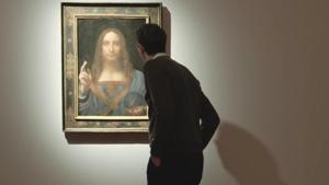 Art critic, Alastair Sooke studies Salvator Mundi, the world’s most expensive painting.(Christie’s/Youtube) Art critic, Alastair Sooke studies Salvator Mundi, the world’s most expensive painting.(Christie’s/Youtube)