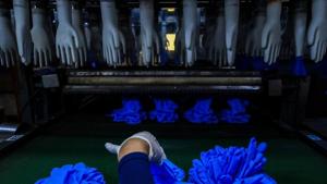 The speed and strength of the gloves boom has been extraordinary, but there are signs the rapid rise could reverse, especially as research for a Covid-19 treatment and vaccine progress.(Bloomberg) The speed and strength of the gloves boom has been extraordinary, but there are signs the rapid rise could reverse, especially as research for a Covid-19 treatment and vaccine progress.(Bloomberg)