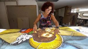 Stained glass maker Maya Husseini works inside her workshop in Hazmiyeh, Lebanon August 13, 2020 Picture taken August 13, 2020.(REUTERS) Stained glass maker Maya Husseini works inside her workshop in Hazmiyeh, Lebanon August 13, 2020 Picture taken August 13, 2020.(REUTERS)