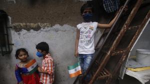 Children hold Indian flags as they celebrate Independence Day in Dharavi, one of Asia's biggest slums, in Mumbai.(AP) Children hold Indian flags as they celebrate Independence Day in Dharavi, one of Asia's biggest slums, in Mumbai.(AP)