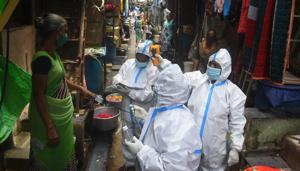 BMC Health worker and doctor conduct thermal screening and pulse test of a resident at Dharavi during Covid 19 pandemic in Mumbai(Vijayanand Gupta/HT Photo) BMC Health worker and doctor conduct thermal screening and pulse test of a resident at Dharavi during Covid 19 pandemic in Mumbai(Vijayanand Gupta/HT Photo)