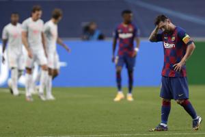 Barcelona's Lionel Messi holds his head during the Champions League quarterfinal match between FC Barcelona and Bayern Munich at the Luz stadium in Lisbon, Portugal, Friday, Aug. 14, 2020. Gerard Piqué says Barcelona "hit rock bottom" in an 8-2 humiliation from Bayern Munich in the Champions League quarterfinals. It's 74 years since Barcelona conceded eight goals in a game. (AP Photo/Manu Fernandez/Pool)(AP) Barcelona's Lionel Messi holds his head during the Champions League quarterfinal match between FC Barcelona and Bayern Munich at the Luz stadium in Lisbon, Portugal, Friday, Aug. 14, 2020. Gerard Piqué says Barcelona "hit rock bottom" in an 8-2 humiliation from Bayern Munich in the Champions League quarterfinals. It's 74 years since Barcelona conceded eight goals in a game. (AP Photo/Manu Fernandez/Pool)(AP)