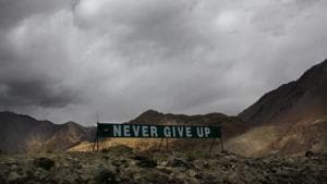 In this Sept. 14, 2017, file photo, a banner erected by the Indian army stands near Pangong Tso lake near the India China border in India's Ladakh area.(AP) In this Sept. 14, 2017, file photo, a banner erected by the Indian army stands near Pangong Tso lake near the India China border in India's Ladakh area.(AP)