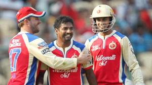 Royal Challengers Bangalore's Muttiah Muralitharan with team mates celebrates the wicket of Sunrisers Hyderabad’s P Patel during their IPL match at Chinnaswamy Stadium in Bengaluru.(PTI) Royal Challengers Bangalore's Muttiah Muralitharan with team mates celebrates the wicket of Sunrisers Hyderabad’s P Patel during their IPL match at Chinnaswamy Stadium in Bengaluru.(PTI)