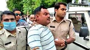 Vikas Dubey was arrested by the Madhya Pradesh Police on July 9 from the premises of the Mahakal Temple in Ujjain after he was on the run for some days following the encounter in Kanpur, where eight policemen were killed.(ANI file photo) Vikas Dubey was arrested by the Madhya Pradesh Police on July 9 from the premises of the Mahakal Temple in Ujjain after he was on the run for some days following the encounter in Kanpur, where eight policemen were killed.(ANI file photo)