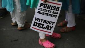 Protesters take out a rally against the rising number of rapes across the country. (AP File) Protesters take out a rally against the rising number of rapes across the country. (AP File)