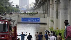 Haryana Emergency Services vehicle deployed for rescue after Golf Course Road underpass was fully inundated following heavy rains in Gurugram.(Parveen Kumar/HT Photo) Haryana Emergency Services vehicle deployed for rescue after Golf Course Road underpass was fully inundated following heavy rains in Gurugram.(Parveen Kumar/HT Photo)