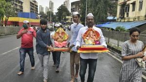 To catch a glimpse of the well-known Ganapati idols like those in Lalbaugcha Raja and Dagdusheth Ganapati, devotees will have to go online instead of visiting in person. (HT Photo ) To catch a glimpse of the well-known Ganapati idols like those in Lalbaugcha Raja and Dagdusheth Ganapati, devotees will have to go online instead of visiting in person. (HT Photo )