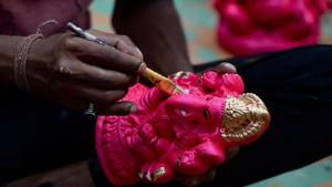 Many Ganpati mandals in the city voluntarily decided to contain Ganesha festivities this year keeping in mind the current Covid-19 situation in the city and state.(AFP)