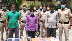 The jeweller (middle) and his two friends after their arrest for a fake robbery.(Sourced) The jeweller (middle) and his two friends after their arrest for a fake robbery.(Sourced)