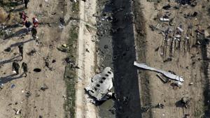 In this Jan. 8, 2020, file photo, rescue workers search the scene where an Ukrainian plane was shot down in Shahedshahr, southwest of Tehran, Iran.(AP photo) In this Jan. 8, 2020, file photo, rescue workers search the scene where an Ukrainian plane was shot down in Shahedshahr, southwest of Tehran, Iran.(AP photo)