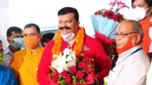 BJP’s Uttarakhand unit Bansidhar Bhagat (right in glasses) welcoming MLA Pranav Singh Champion back into the party on Monday at his residence in Dehradun.(HT PHOTO)
