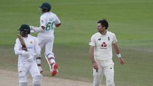 England's James Anderson, right, watches as Pakistan's captain Azhar Ali, left, and Abid Ali run between the wickets to score during the fourth day of the third cricket Test match between England and Pakistan, at the Ageas Bowl in Southampton, England, Monday, Aug. 24, 2020.(AP) England's James Anderson, right, watches as Pakistan's captain Azhar Ali, left, and Abid Ali run between the wickets to score during the fourth day of the third cricket Test match between England and Pakistan, at the Ageas Bowl in Southampton, England, Monday, Aug. 24, 2020.(AP)