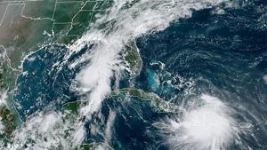 The Gulf Coast braced for a history-making onslaught from tropical storms Marco and Laura, with many evacuees recalling the damage caused by Hurricane Katrina in 2005.(AFP/ RAMMB/NOAA) The Gulf Coast braced for a history-making onslaught from tropical storms Marco and Laura, with many evacuees recalling the damage caused by Hurricane Katrina in 2005.(AFP/ RAMMB/NOAA)