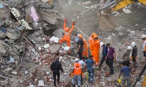 Rescue personnel sift through the rubble in search of survivors at the site where a five-storey building collapsed in Mahad town of Maharashtra’s Raigad district.(PTI Photo) Rescue personnel sift through the rubble in search of survivors at the site where a five-storey building collapsed in Mahad town of Maharashtra’s Raigad district.(PTI Photo)