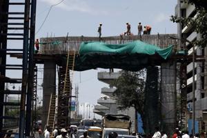 Workers are seen at a segment of metro construction site in Pune. India, once the world’s fastest-growing major economy, is set to post the steepest quarterly decline in gross domestic product, experts have said.(Rahul Raut/HT Photo) Workers are seen at a segment of metro construction site in Pune. India, once the world’s fastest-growing major economy, is set to post the steepest quarterly decline in gross domestic product, experts have said.(Rahul Raut/HT Photo)