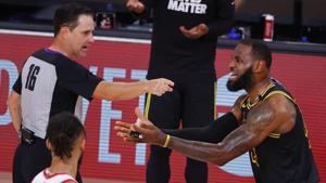 Referee David Guthrie (16) points to Los Angeles Lakers' LeBron James, right, during the third quarter of Game 4 of an NBA basketball first-round playoff series against the Portland Trail Blazers, Monday, Aug. 24, 2020, in Lake Buena Vista, Fla. (Kevin C. Cox/Pool Photo via AP)(AP) Referee David Guthrie (16) points to Los Angeles Lakers' LeBron James, right, during the third quarter of Game 4 of an NBA basketball first-round playoff series against the Portland Trail Blazers, Monday, Aug. 24, 2020, in Lake Buena Vista, Fla. (Kevin C. Cox/Pool Photo via AP)(AP)