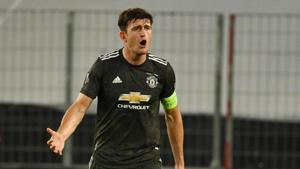 FILE PHOTO: Soccer Football - Europa League Semi Final - Sevilla v Manchester United - RheinEnergieSTADION, Cologne, Germany - August 16, 2020 Manchester United's Harry Maguire reacts, as play resumes behind closed doors following the outbreak of the coronavirus disease (COVID-19) Ina Fassbender/Pool via REUTERS/File Photo(REUTERS) FILE PHOTO: Soccer Football - Europa League Semi Final - Sevilla v Manchester United - RheinEnergieSTADION, Cologne, Germany - August 16, 2020 Manchester United's Harry Maguire reacts, as play resumes behind closed doors following the outbreak of the coronavirus disease (COVID-19) Ina Fassbender/Pool via REUTERS/File Photo(REUTERS)