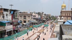 People seen walking on a newly constructed stretch at Chandni Chowk. The DCP said police received a call about the hanging of the brothers on the third floor of their shop.(Arvind Yadav/HT PHOTO) People seen walking on a newly constructed stretch at Chandni Chowk. The DCP said police received a call about the hanging of the brothers on the third floor of their shop.(Arvind Yadav/HT PHOTO)