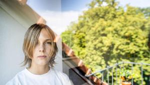 Dutch writer and poet Marieke Lucas Rijneveld poses during a photo session in Ultrecht on July 22, 2020. Marieke Lucas Rijneveld has won on August 26, 2020 the International Booker Prize with the English translation of the book De avond is ongemak (The Discomfort of Evening).(AFP) Dutch writer and poet Marieke Lucas Rijneveld poses during a photo session in Ultrecht on July 22, 2020. Marieke Lucas Rijneveld has won on August 26, 2020 the International Booker Prize with the English translation of the book De avond is ongemak (The Discomfort of Evening).(AFP)