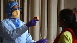 Thermal screening being done in Kolkata.(Samir Jana/ HT photo) Thermal screening being done in Kolkata.(Samir Jana/ HT photo)