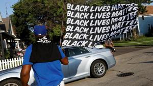 The protests started after Jacob Blake was shot multiple times in the back by a police officer on Sunday afternoon.(Reuters)