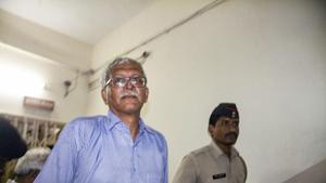 Activist Vernon Gonsalves, arrested in connection with the Bhima Koregaon violence case, during an earlier court appearance.(PTI File Photo) Activist Vernon Gonsalves, arrested in connection with the Bhima Koregaon violence case, during an earlier court appearance.(PTI File Photo)