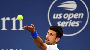 Aug 29, 2020; Flushing Meadows, New York, USA; Novak Djokovic (SRB) serves the ball against Milos Raonic (CAN) during the Western & Southern Open at the USTA Billie Jean King National Tennis Center. Mandatory Credit: Robert Deutsch-USA TODAY Sports(USA TODAY Sports) Aug 29, 2020; Flushing Meadows, New York, USA; Novak Djokovic (SRB) serves the ball against Milos Raonic (CAN) during the Western & Southern Open at the USTA Billie Jean King National Tennis Center. Mandatory Credit: Robert Deutsch-USA TODAY Sports(USA TODAY Sports)
