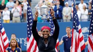 FILE PHOTO: Serena Williams of the U.S. raises her trophy.(REUTERS) FILE PHOTO: Serena Williams of the U.S. raises her trophy.(REUTERS)